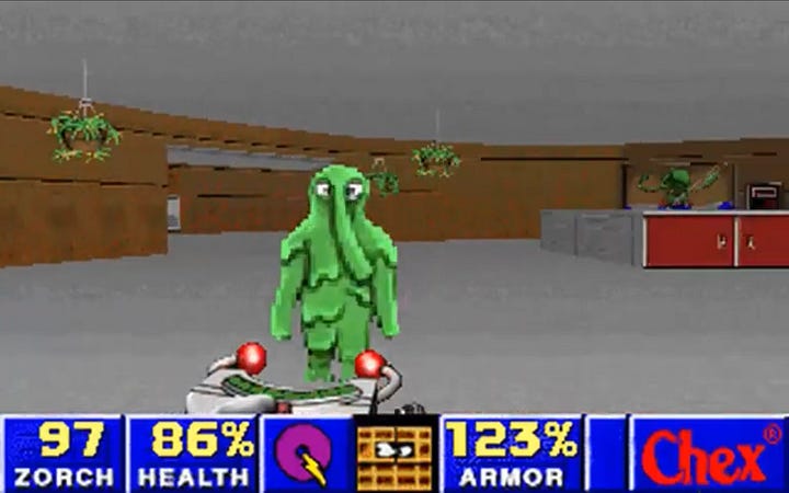 First-person view in Chex Quest: a green, slimy Flemoid stands in a room with hanging plants, above a status bar showing zorch, health, armour and the Chex logo