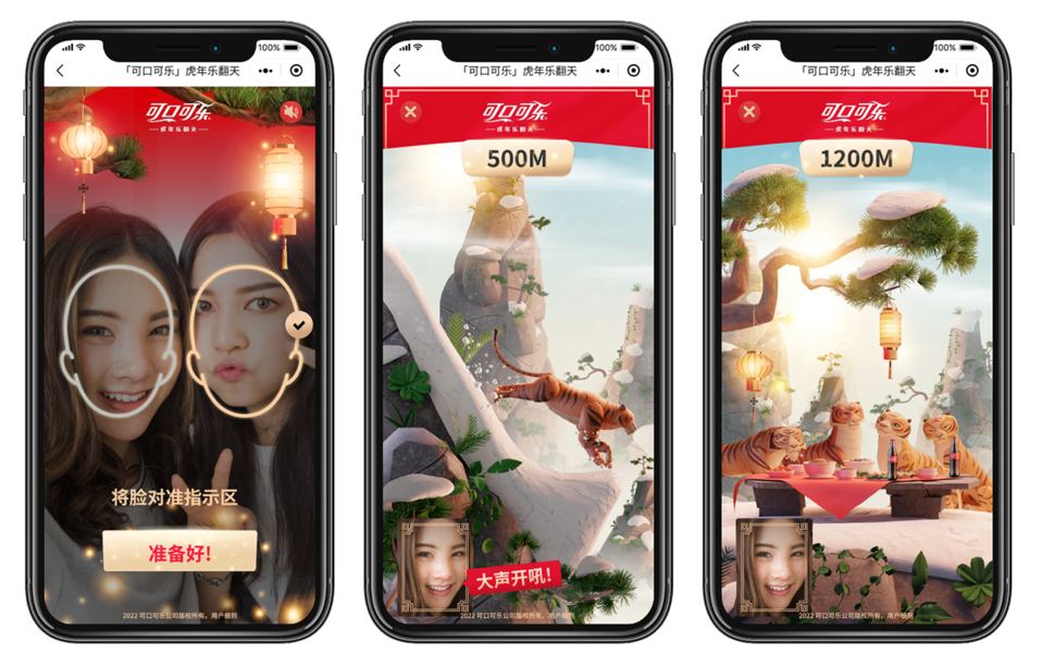 Three phones showing Coca-Cola's Chinese New Year Games in WeChat: two players line their faces up with on-screen guides, a tiger leaps between cliffs at 500M with a red prompt in Chinese to shout loudly, and a 1200M screen shows tigers at a feast table with Coca-Cola bottles