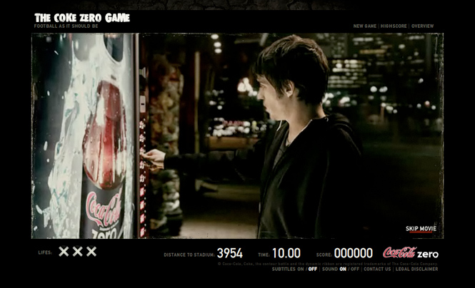 Live-action frame from The Coke Zero Game: a young man at a Coca-Cola Zero vending machine, with lives, distance to stadium, time and score along the bottom