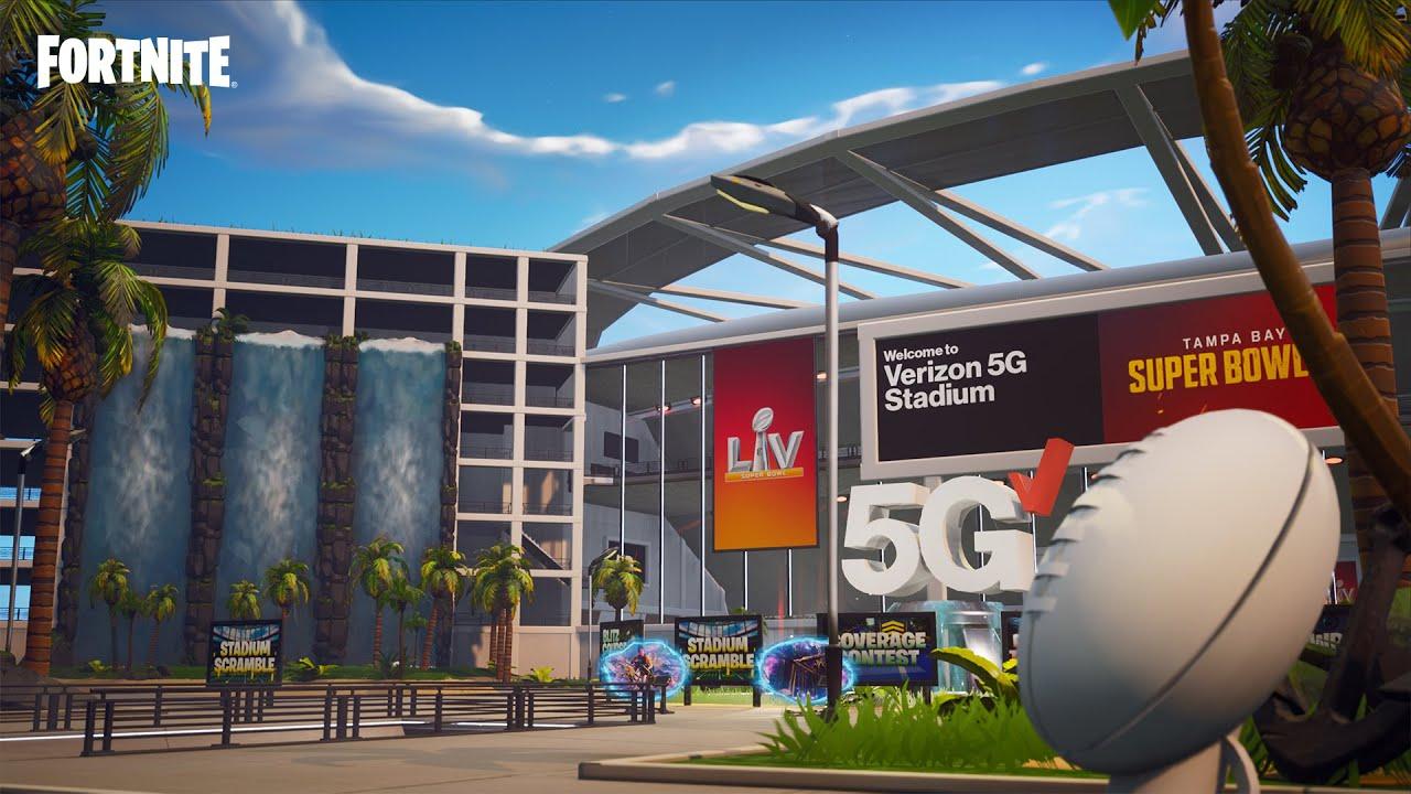Entrance of the Verizon 5G Stadium in Fortnite, with Super Bowl LV banners, waterfalls and portals to the stadium mini-games