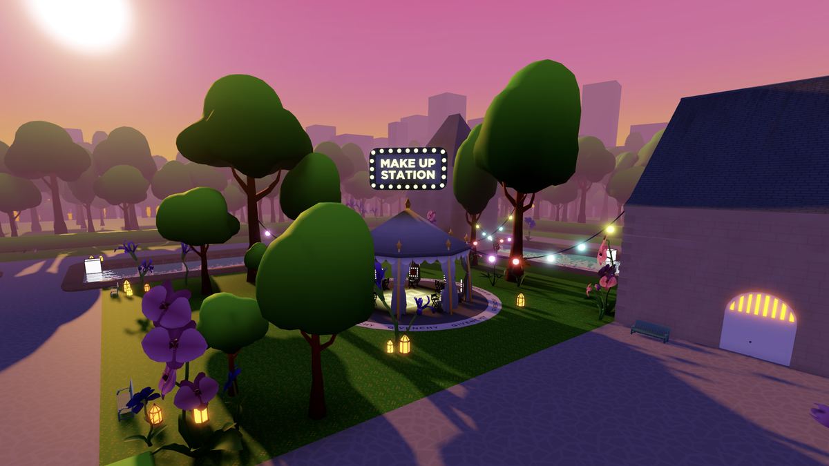 Givenchy Beauty House on Roblox: a blue gazebo under a lit Make Up Station sign, with trees, purple flowers and string lights around it under a pink sky