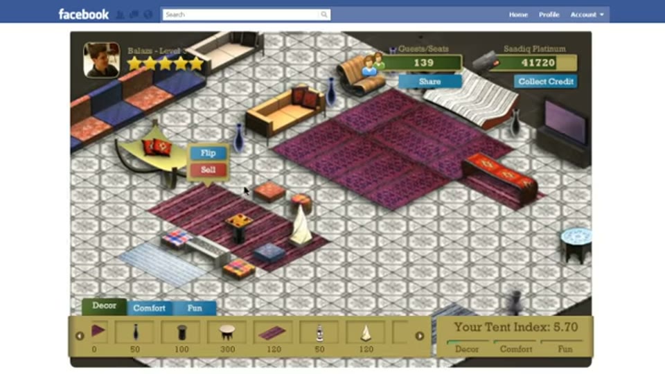 My Majlis game on Facebook for Standard Chartered, with an isometric tiled floor furnished with rugs, sofas and cushions