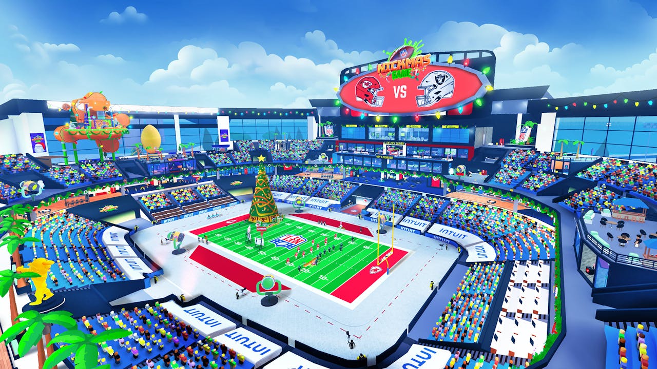 The Roblox football stadium in Super NFL Tycoon dressed for Nickmas, with a Christmas tree on the NFL field, Intuit boards and a Chiefs vs Raiders scoreboard