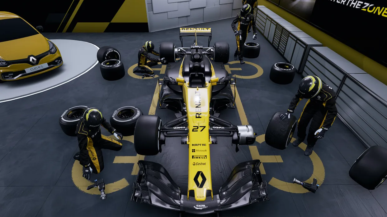 Pitstop Challenge for Renault: four pit-crew avatars in black and yellow Renault overalls change the tyres of the black and yellow Renault Formula 1 car number 27 in a virtual garage, next to a yellow Clio R.S. and a partly visible Enter the Zone sign
