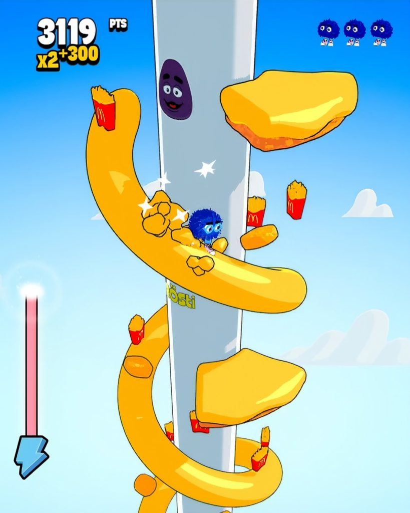 Rösti Fall gameplay for McDonald's: a blue furry character rides a yellow spiral wound round a tower, past fries packets and golden rösti, with 3119 points on the scoreboard