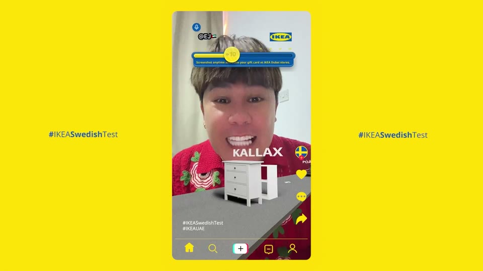 A player in IKEA's Swedish Test TikTok effect faces the camera as the word KALLAX hovers over a white chest of drawers on a grey track; a part-filled score bar with a +10 coin sits below a microphone icon and the IKEA logo, framed by the hashtag IKEASwedishTest