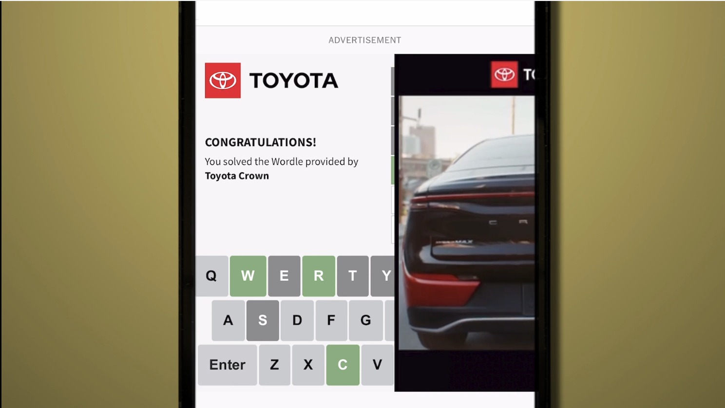 The Second Wordle for Toyota: a phone screen under an Advertisement label with the Toyota logo, the message You solved the Wordle provided by Toyota Crown, a Wordle keyboard with W, R and C in green, and a panel showing the rear of a dark sedan