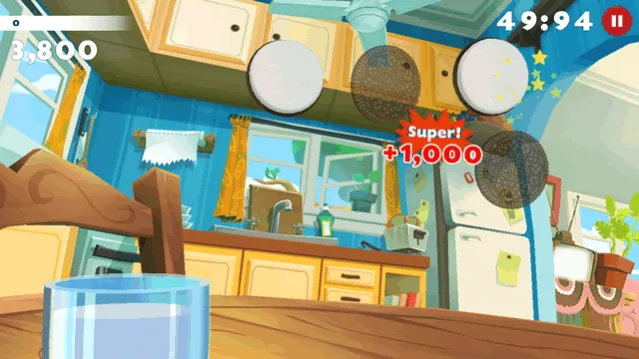 Twist, Lick, Dunk for Oreo: Oreo cookie halves, two of them cream side out, fly across a cartoon kitchen with a Super +1,000 bonus, a score of 3,800 and a countdown at the top, and a glass of milk in the foreground