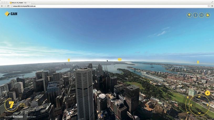 Where's My Wallet? for CommBank in a browser, showing an aerial city panorama, a wallets-left counter and navigation dial